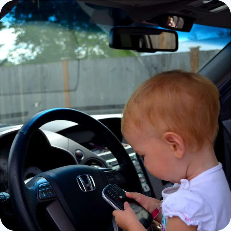 baby texting in car